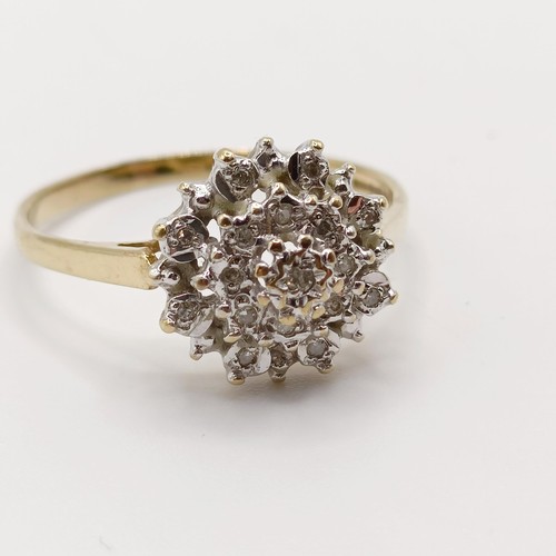 876 - A 9ct gold diamond cluster ring, ring size S