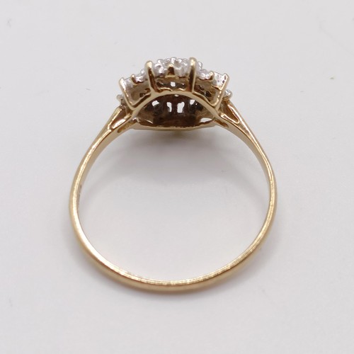 876 - A 9ct gold diamond cluster ring, ring size S