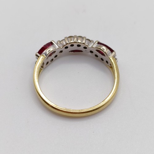 874 - An 18ct gold, ruby and diamond ring, ring size N 1/2