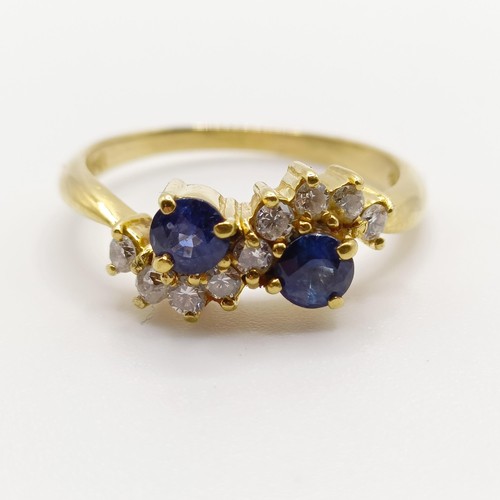 862 - An 18ct gold, diamond and sapphire ring, ring size K