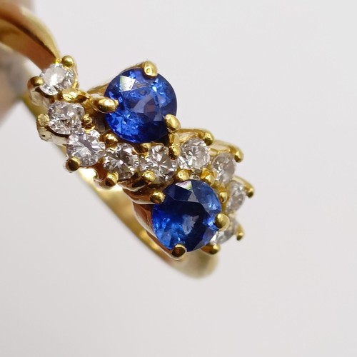 862 - An 18ct gold, diamond and sapphire ring, ring size K