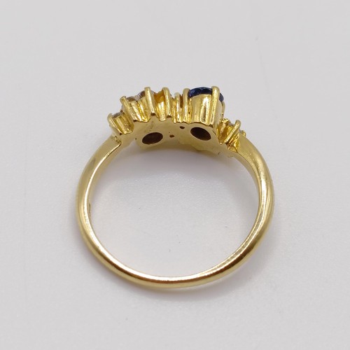 862 - An 18ct gold, diamond and sapphire ring, ring size K