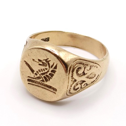 852 - A 9ct gold signet ring, ring size T, 8.6 g