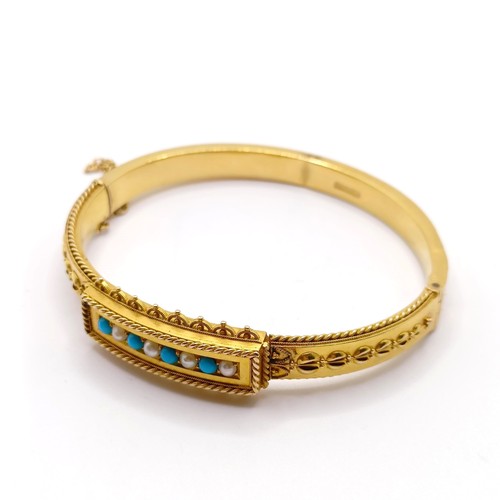 836 - A 15ct gold, seed pearl and turquoise bangle, all in 15.8 g