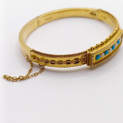 836 - A 15ct gold, seed pearl and turquoise bangle, all in 15.8 g