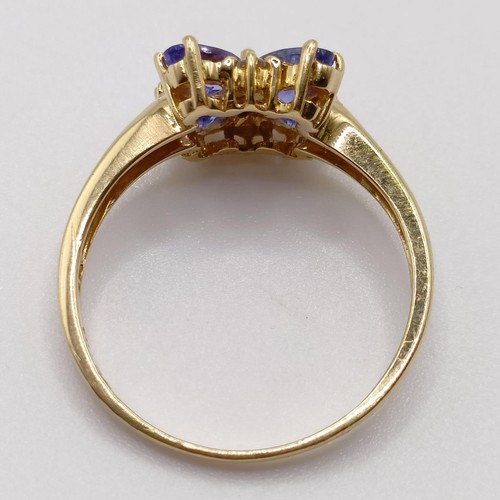 808 - An 18ct gold and tanzanite ring, ring size M 1/2