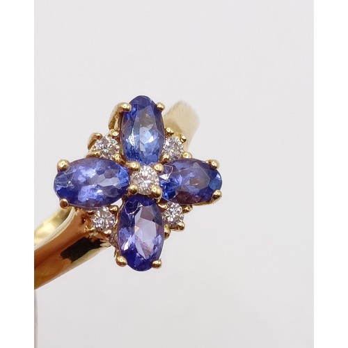 808 - An 18ct gold and tanzanite ring, ring size M 1/2