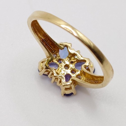 808 - An 18ct gold and tanzanite ring, ring size M 1/2