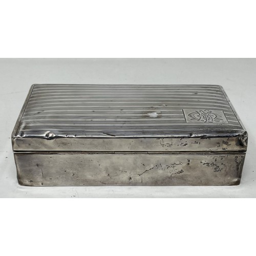 1089 - A George VI silver cigarette box, Birmingham 1935, 18 cm wide