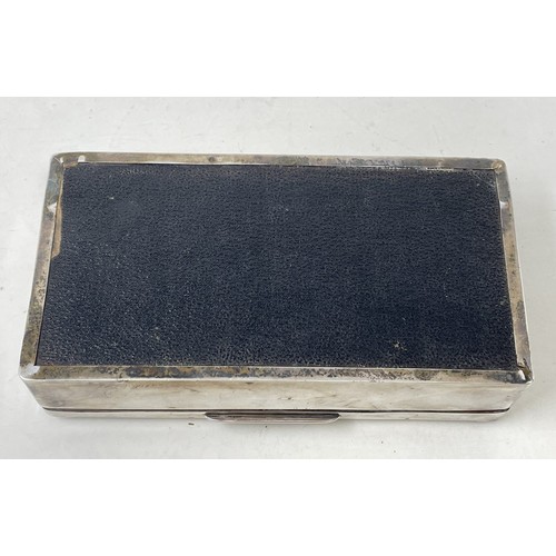 1089 - A George VI silver cigarette box, Birmingham 1935, 18 cm wide