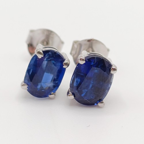 845 - A pair of kyanite studs, in silver