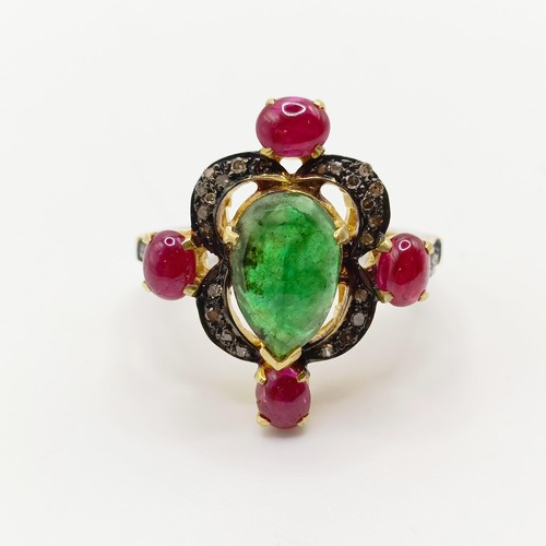 801 - A vintage style rose cut pear shaped emerald ring, with oval cabochon rubies and rose cut diamonds i... 