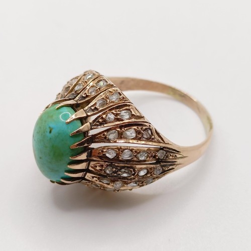 773 - A large high carat yellow gold vintage cocktail ring, set with a large turquoise and rose cut diamon... 