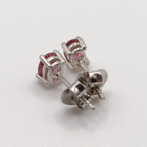 844 - A pair of pink tourmaline studs, in silver