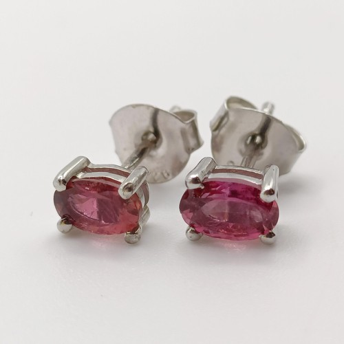 844 - A pair of pink tourmaline studs, in silver