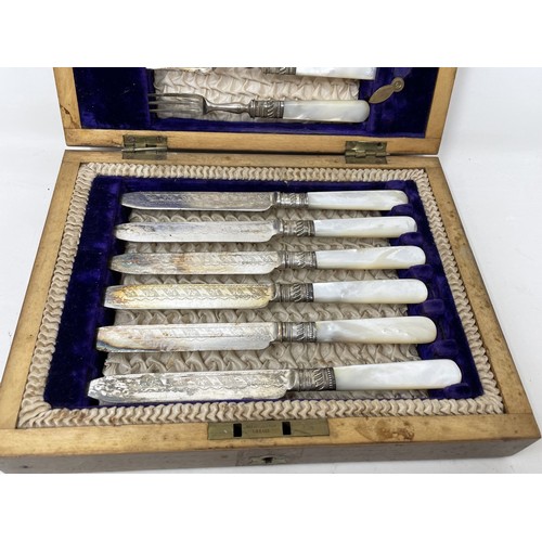 1109 - A modern silver coaster, and a set of silver plated fish knives and forks, with mother of pearl hand... 