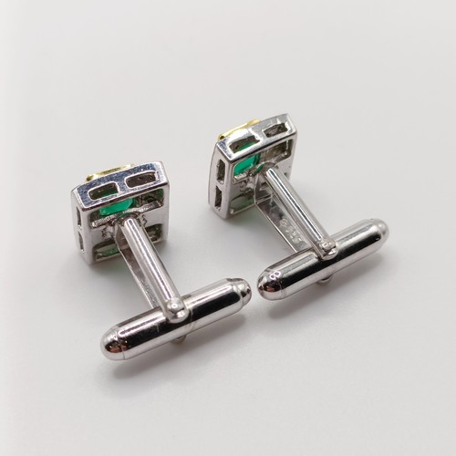 803 - A pair of rectangular emerald cut, emerald and rose cut diamond cufflinks