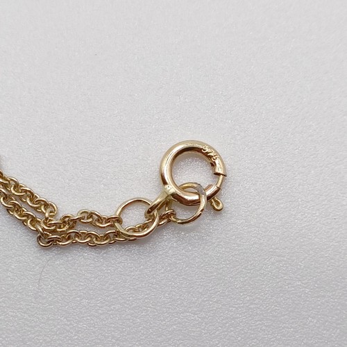 720 - A 9ct yellow gold, round freshwater pearl and diamond pendant, on a 9ct yellow gold chain, boxed