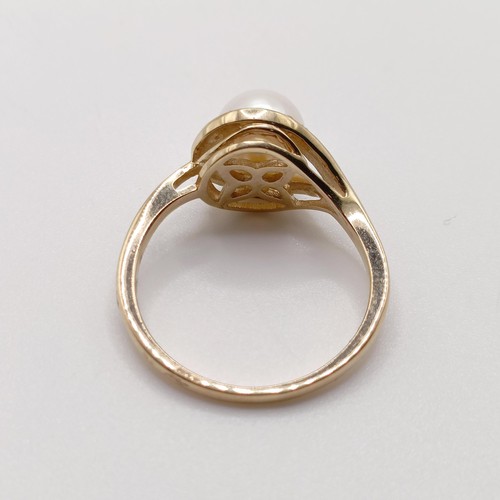 747 - A 9ct yellow gold, white cultured pearl and diamond half moon ring, diamonds 0.05ct