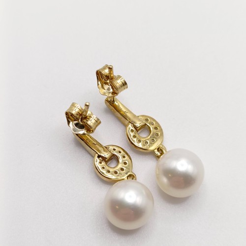 733 - A pair of Art Deco style 9ct yellow gold drop earrings, set with round cultured freshwater pearls an... 