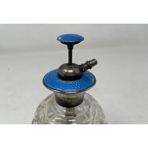 1140 - A cut glass, silver plated and blue enamel infuser