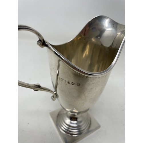 1209 - A George V silver cream jug, Birmingham 1933, 4.3 ozt