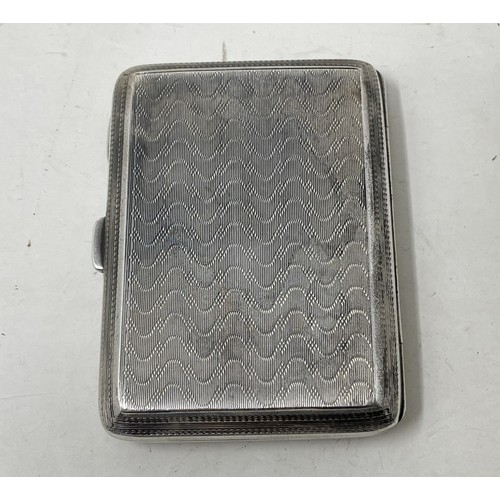 1232 - A silver cigarette case, Chester 1949, 2.9 ozt