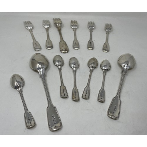 1246 - A matched part table service of silver fiddle and thread pattern cutlery, comprising a tablespoon, t... 