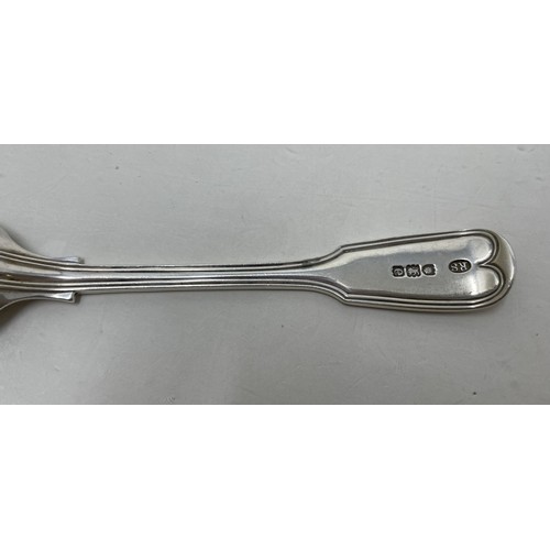 1246 - A matched part table service of silver fiddle and thread pattern cutlery, comprising a tablespoon, t... 