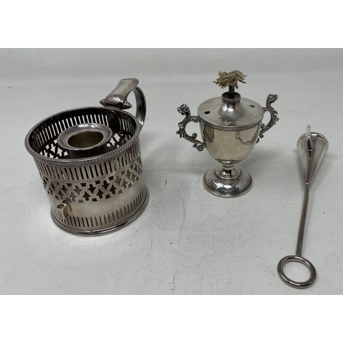 1252 - A silver coloured metal table lighter, and a silver plated chamberstick (2)