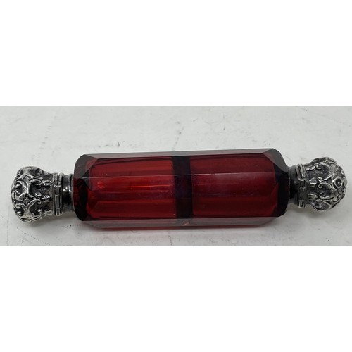 1255 - A Victorian ruby glass double ended scent bottle, with silver mounts