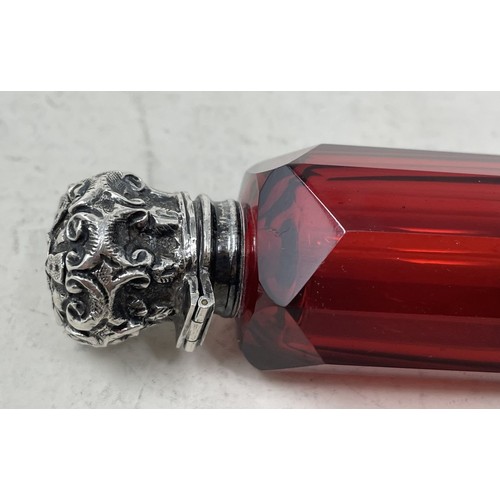 1255 - A Victorian ruby glass double ended scent bottle, with silver mounts