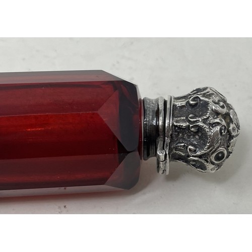 1255 - A Victorian ruby glass double ended scent bottle, with silver mounts