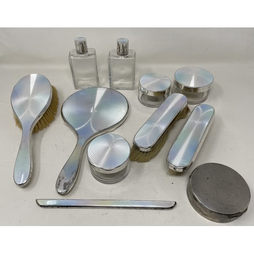 1261 - A silver and enamel dressing table set