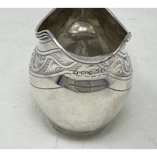 1278 - A George III silver cream jug, marks rubbed, 2.8 ozt