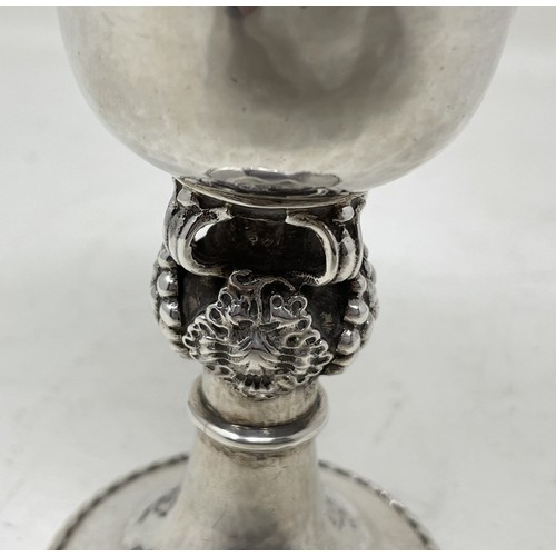 1286 - A silver goblet, with hammered decoration, on a fruit stem, Omar Ramsden, London 1938, 5.6 ozt, 12 c... 