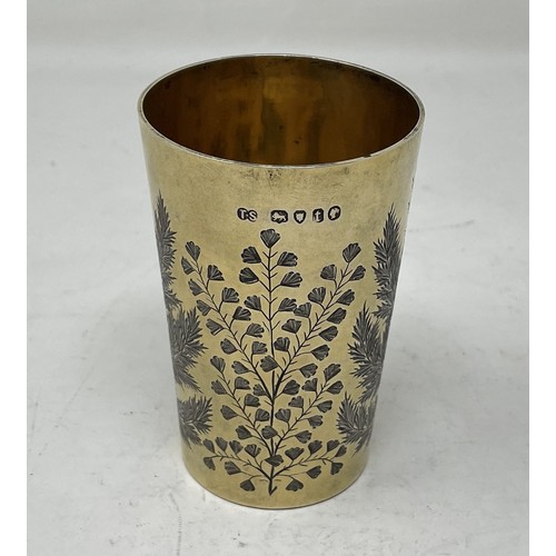 1300 - A Victorian silver gilt beaker, engraved ferns, London 1874, 2.7 ozt