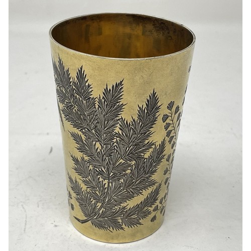 1300 - A Victorian silver gilt beaker, engraved ferns, London 1874, 2.7 ozt