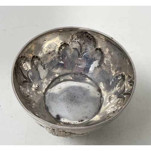 1313 - A rare Vienna Work Shops silver bowl, decorated stylised flowers, on ball feet, 156 g,  8 cm high