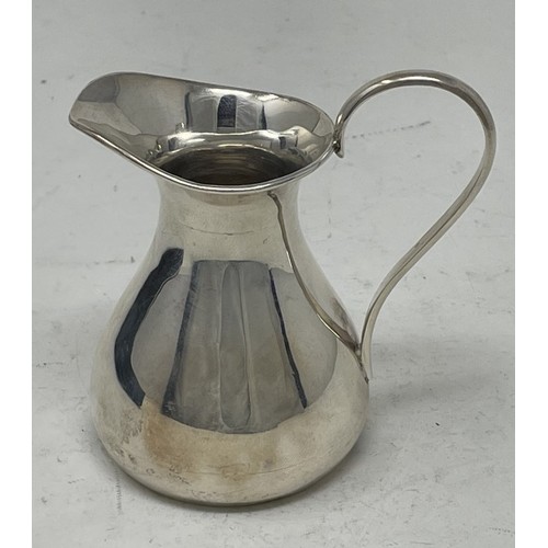 1213 - A George V silver jug, Birmingham 1919, 57 g, cased