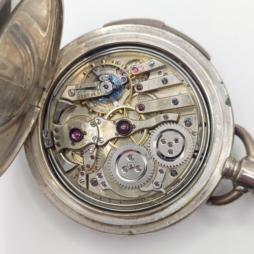 1017 - A silver coloured metal hunter pocket watch, with repeat, engraved an armorial