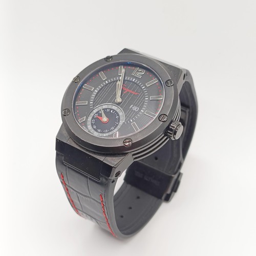 1018 - A gentleman's Ferragamo F-80 wristwatch, with a black case and dial, baton indices and subsidiary ca... 