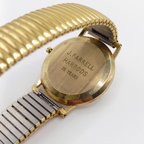 1019 - A gentleman's Omega Quartz wristwatch, with baton indices and date, on a later expanding bracelet