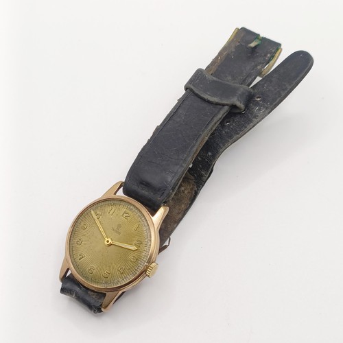 1027 - A gentleman's 9ct gold Tudor wristwatch, on a leather strap