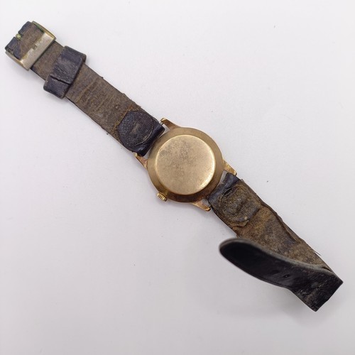 1027 - A gentleman's 9ct gold Tudor wristwatch, on a leather strap