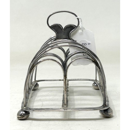 1349 - A George III silver six section toast rack, London 4.6 ozt