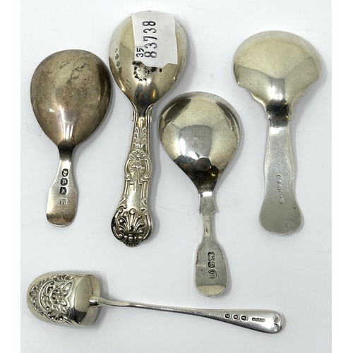 1352 - A George III silver caddy spoon, and four others, 95 g (5)