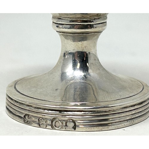 1354 - A George III silver pepper, and another similar, 3.4 ozt (2)