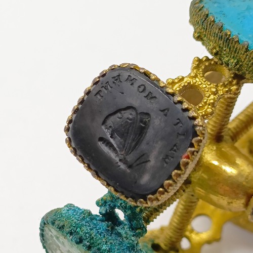 854 - A 19th century gilt metal revolving seal, with a mother of pearl handle