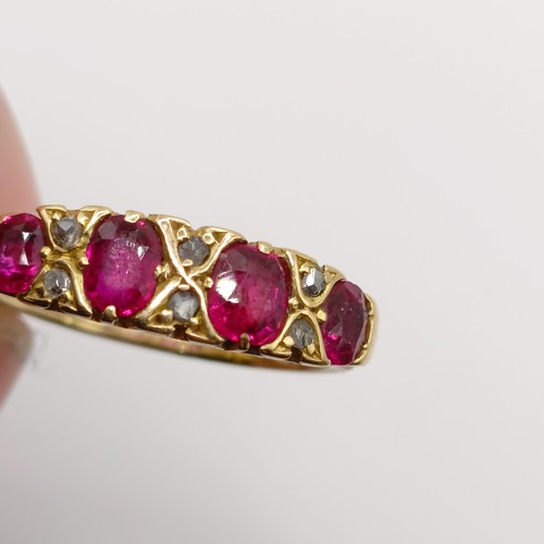 812 - A yellow metal, ruby and diamond ring, ring size P